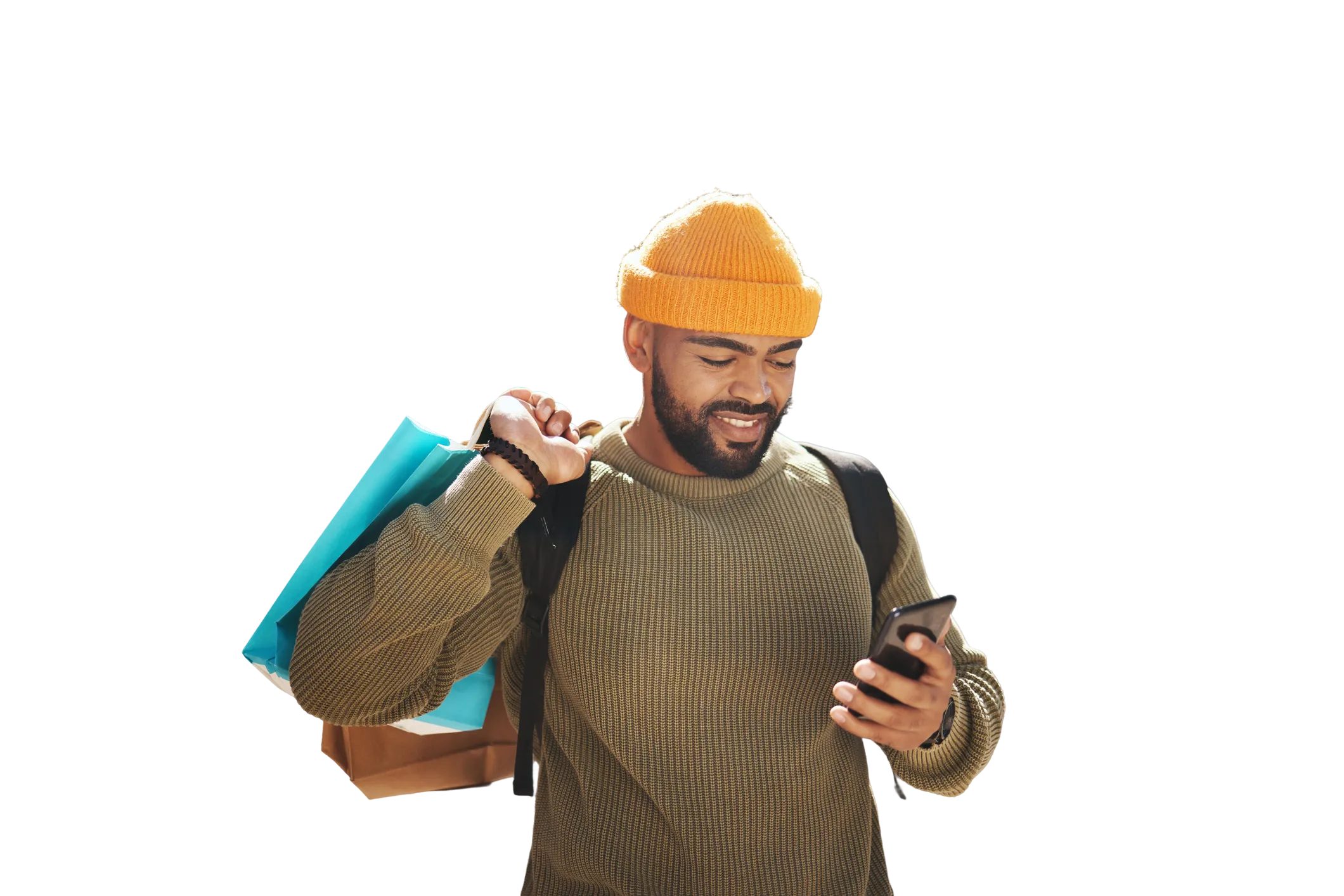 Person shopping with phone and shopping bags