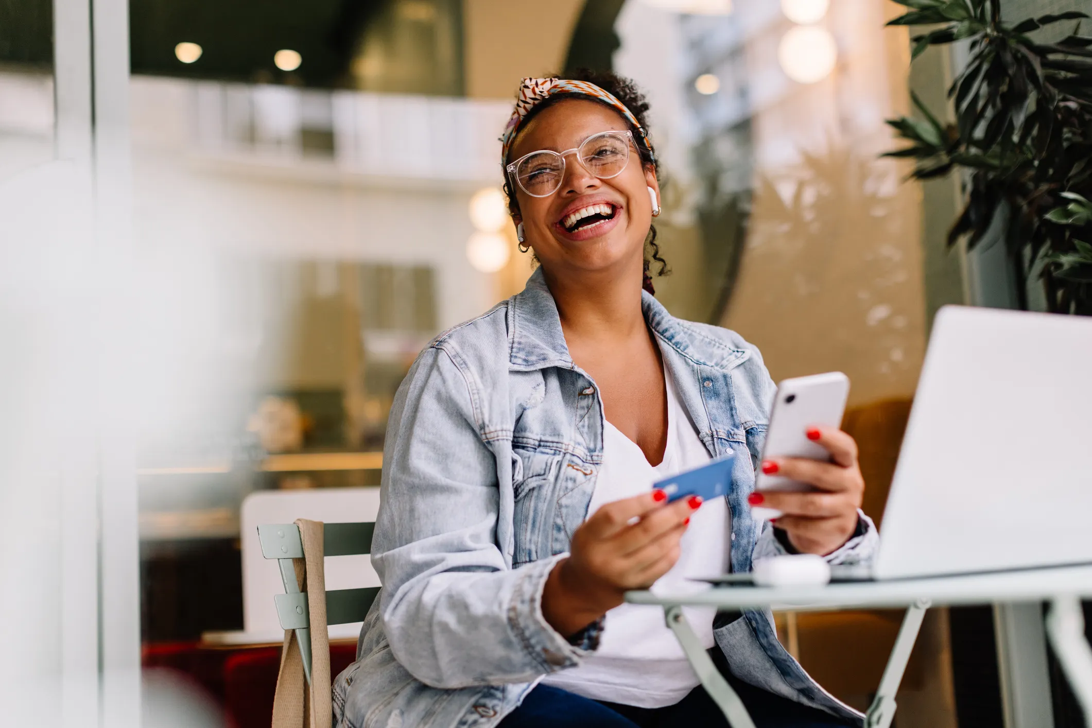 Happy woman sending money with Jingle Pay